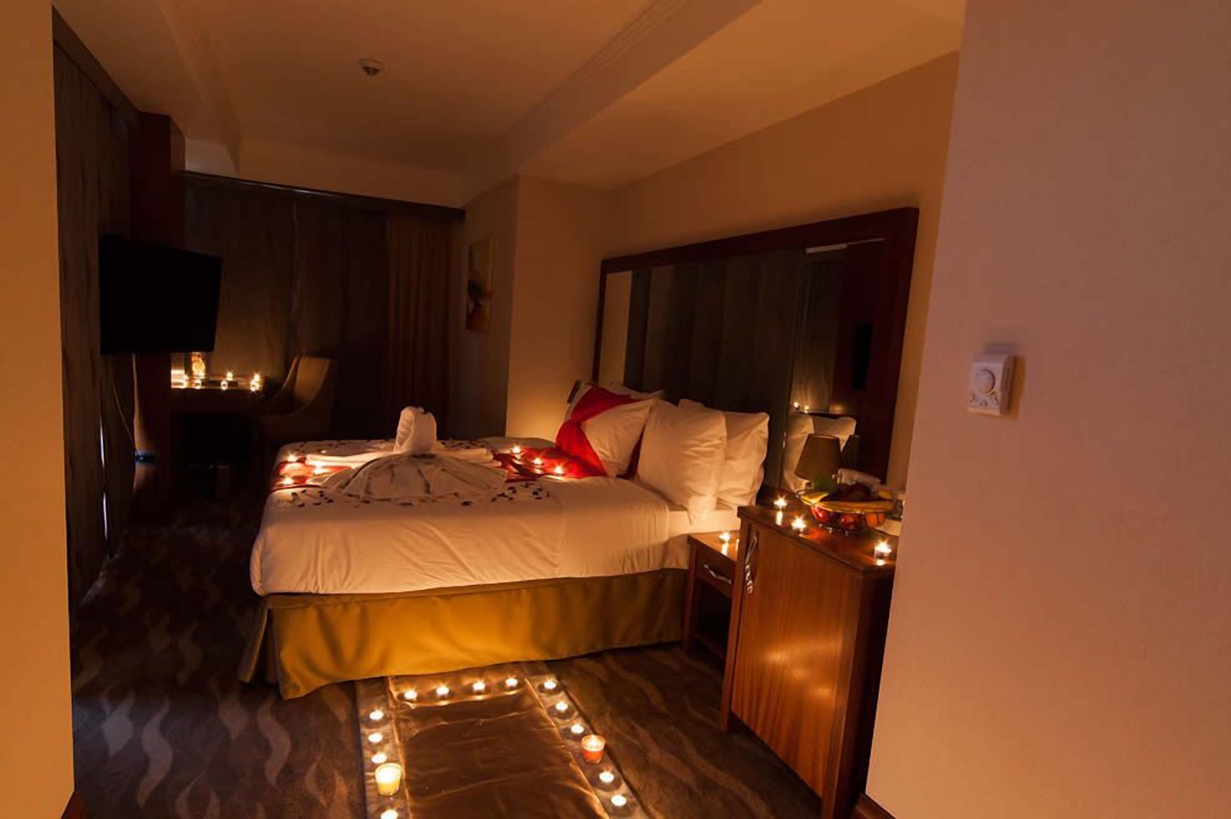 egyptian cotton sheets, down duvets, minibar, in-room safe