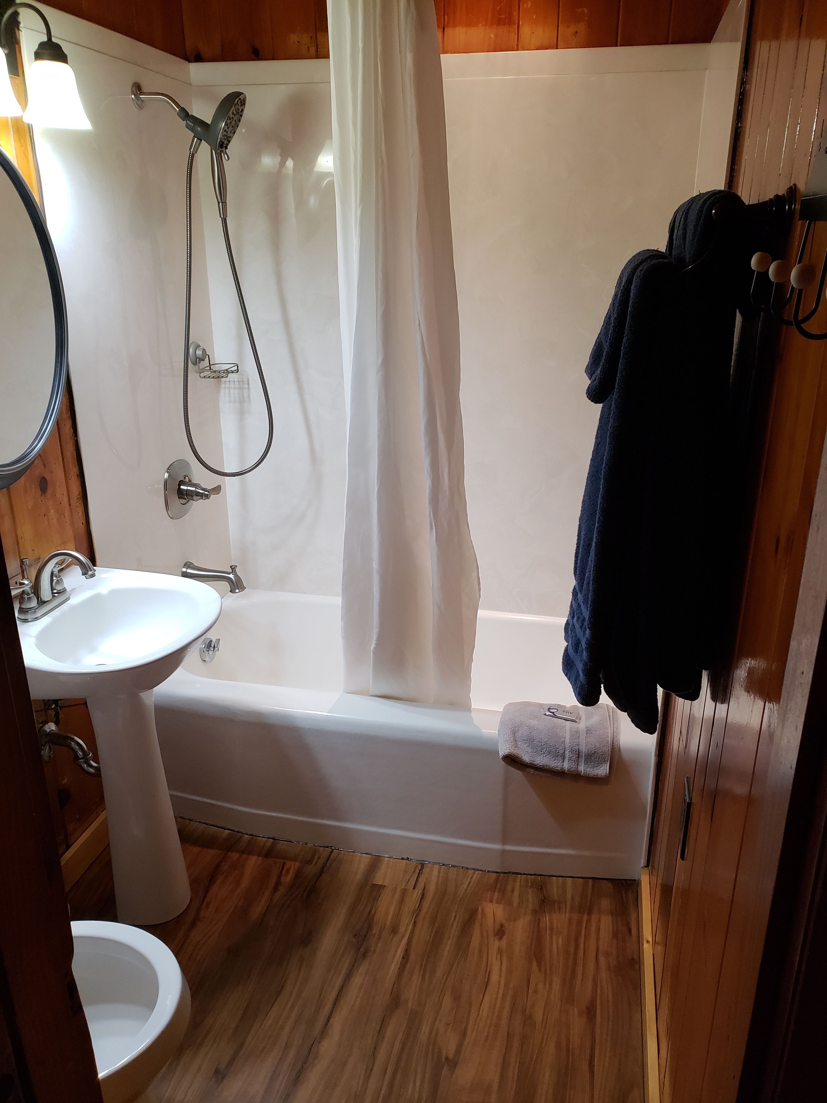 family room, 2 bedrooms (3 double beds) | bathroom | combined shower/bathtub, hydromassage showerhead, free toiletries