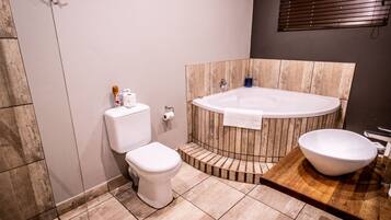 Separate tub and shower, free toiletries, bathrobes, towels