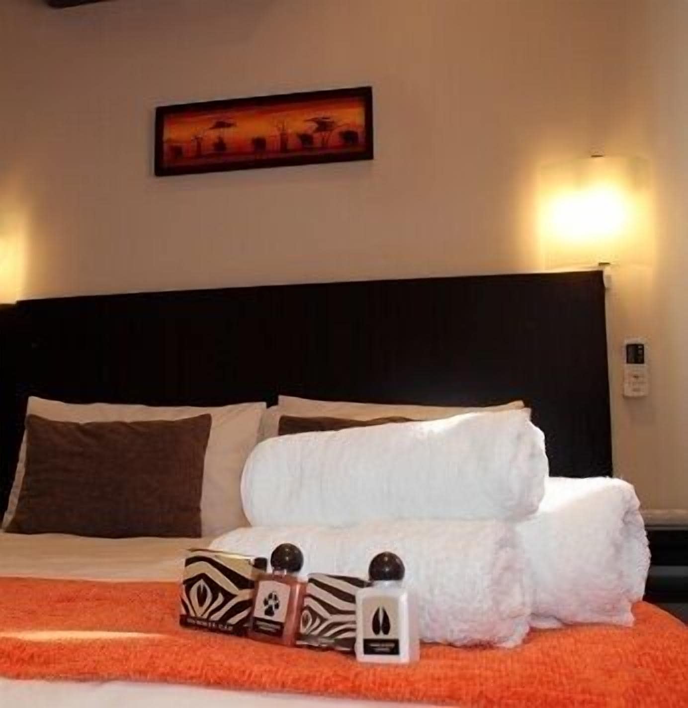 Coffres-forts dans les chambres, bureau, fer et planche à repasser