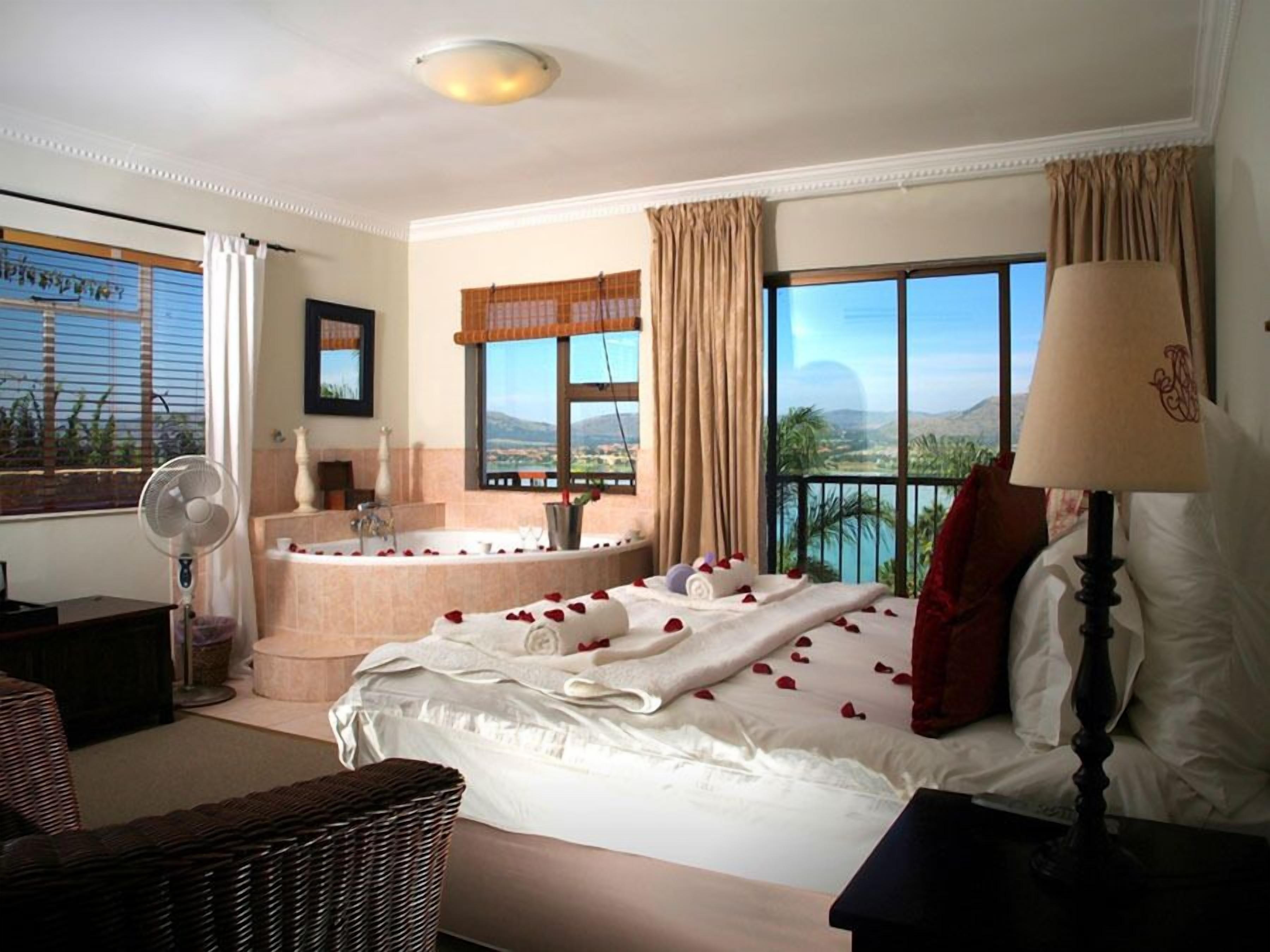 Quarto lua de mel | Frigobar, cofres nos quartos, camas extras/dobráveis, roupa de cama