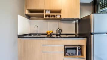 Two Bedroom Suite | Private kitchen | Full-size fridge, microwave, stovetop, electric kettle