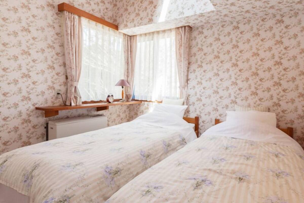 Chambre avec lits jumeaux