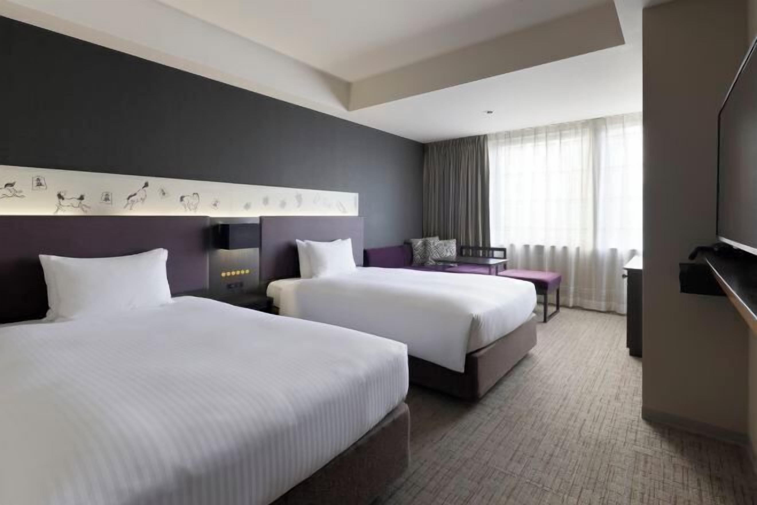 Down comforters, desk, free WiFi, bed sheets