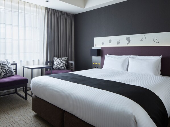 Chambre supérieure, 1 grand lit, fumeur | Couette en duvet, bureau, accès au Wi-Fi (inclus), literie fournie