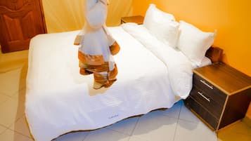 Premium bedding, desk, laptop workspace, free WiFi
