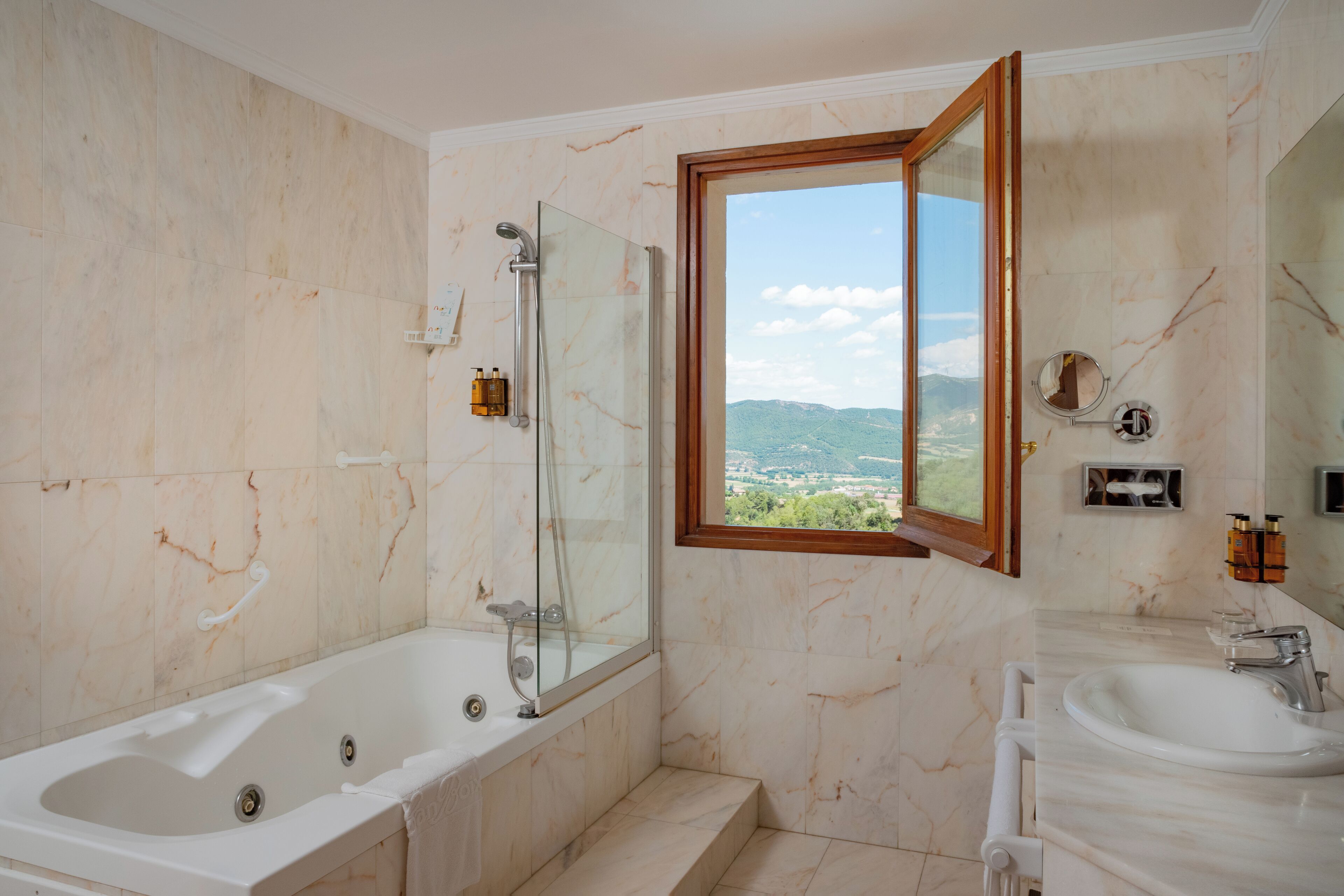 Jetted bath, free toiletries, hair dryer, bathrobes