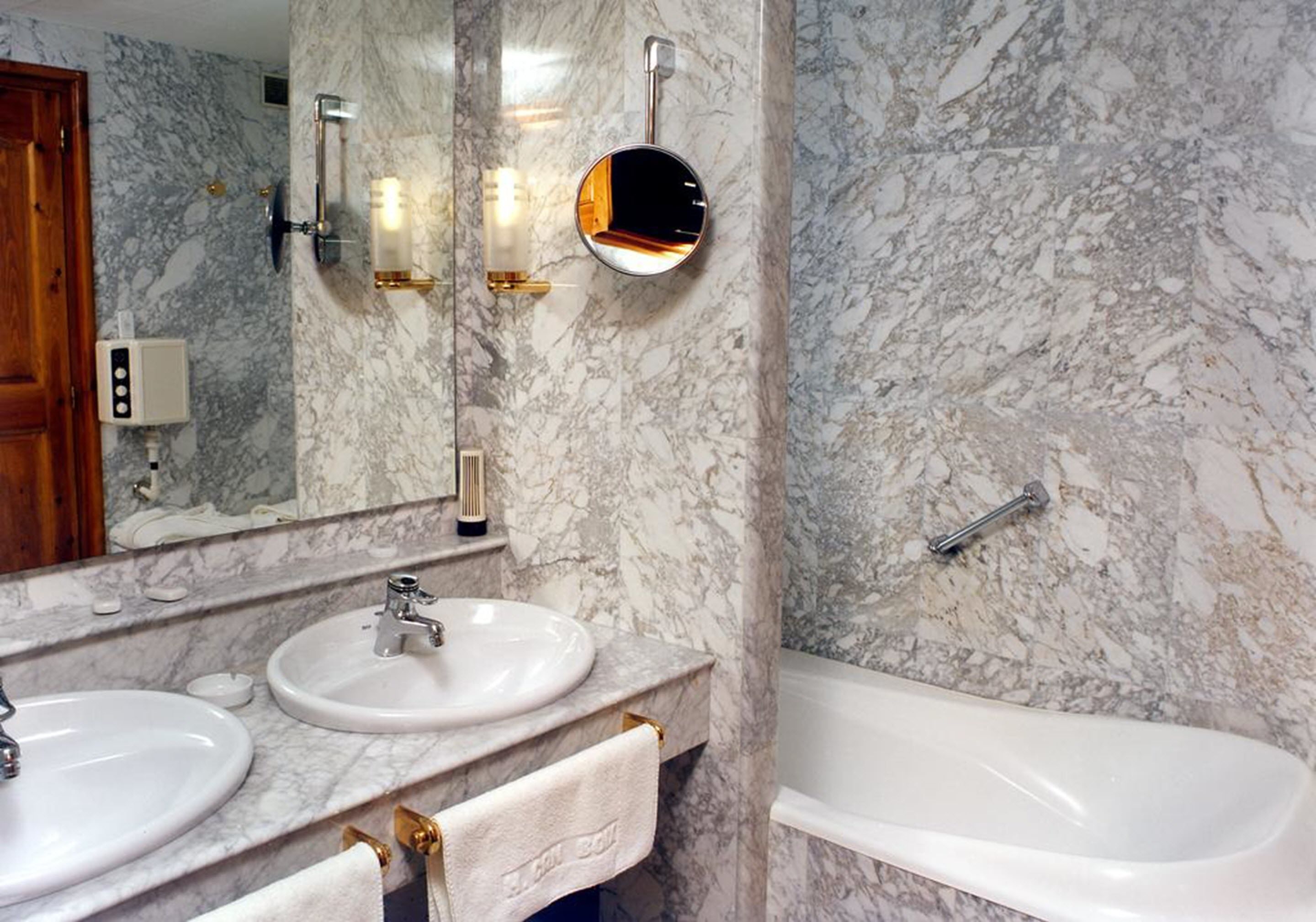 jetted bath, free toiletries, hair dryer, bathrobes