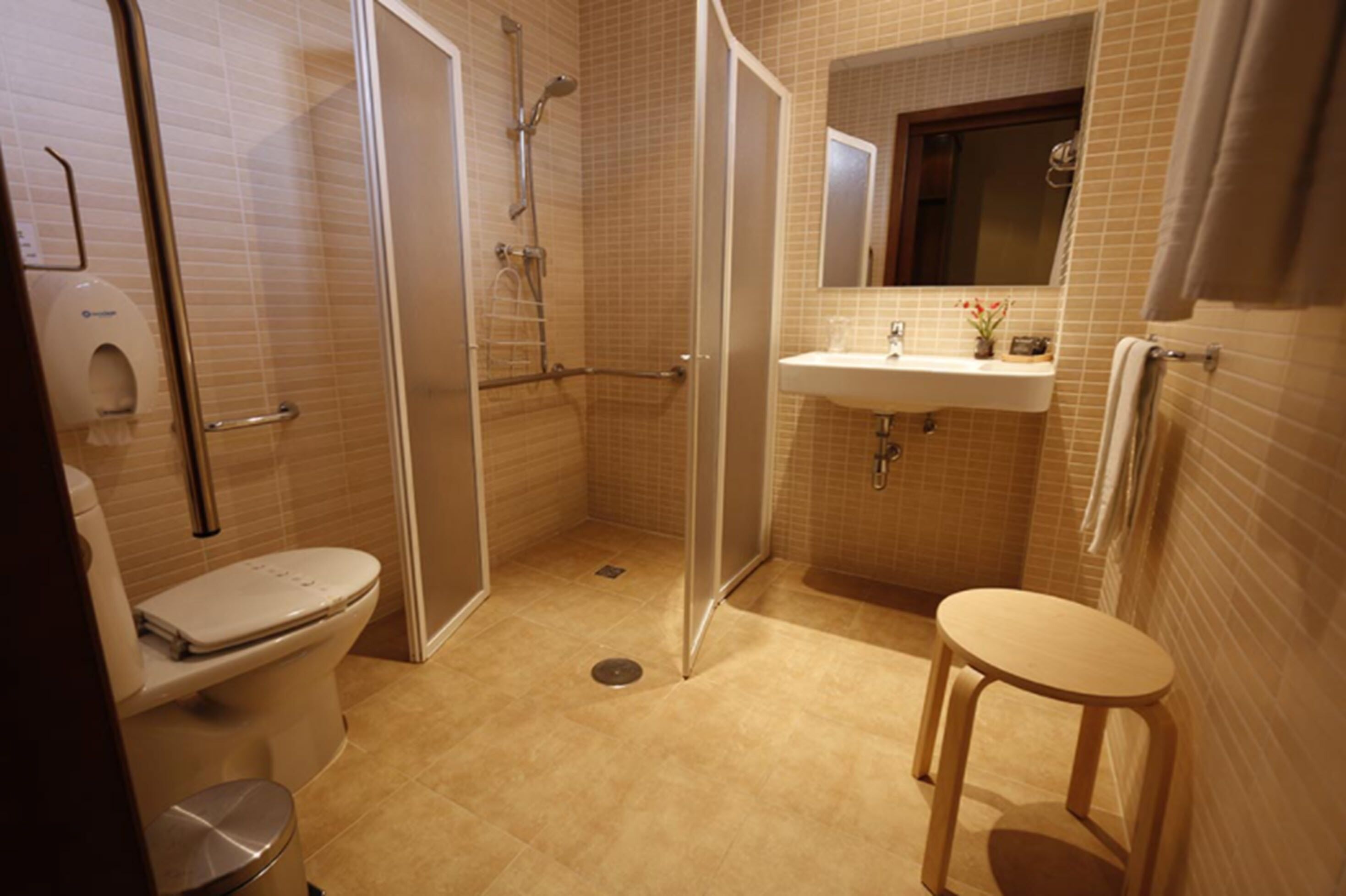 Designer toiletries, hair dryer, towels