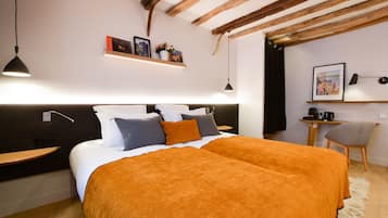 Deluxe Room | Premium bedding, minibar, in-room safe, individually decorated