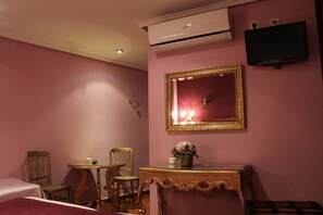 Habitación triple | Área de sala de estar