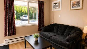 Chambre Double Supérieure, 1 grand lit | Coin séjour