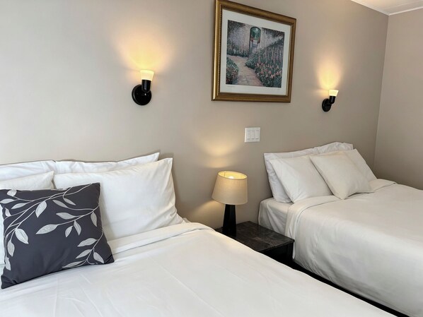 2 Queen Beds | Free WiFi, bed sheets