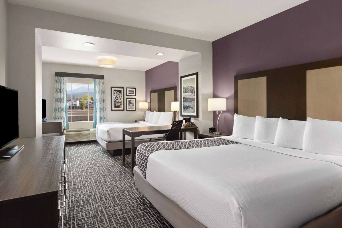 premium bedding, pillow-top beds, desk, blackout curtains
