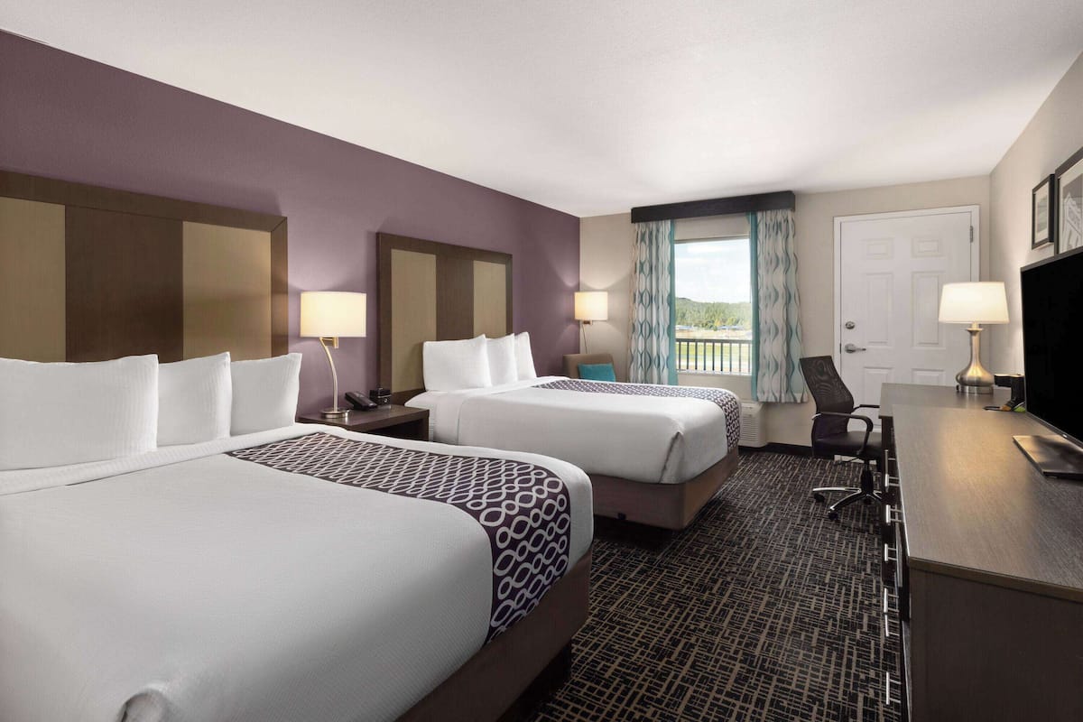 deluxe room, 2 queen beds, non smoking | premium bedding, pillow-top beds, desk, blackout curtains