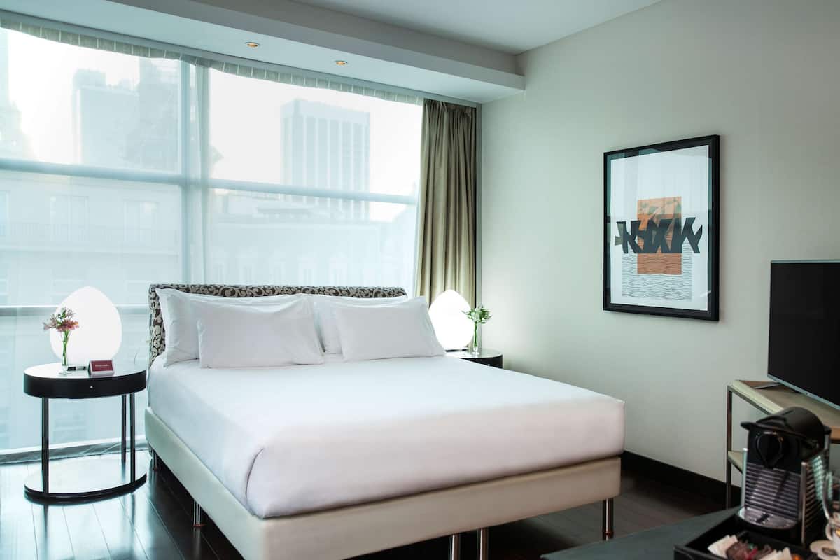 Kamar Premium | Seprai premium, selimut bulu angsa, bantalan ekstra lembut, dan minibar