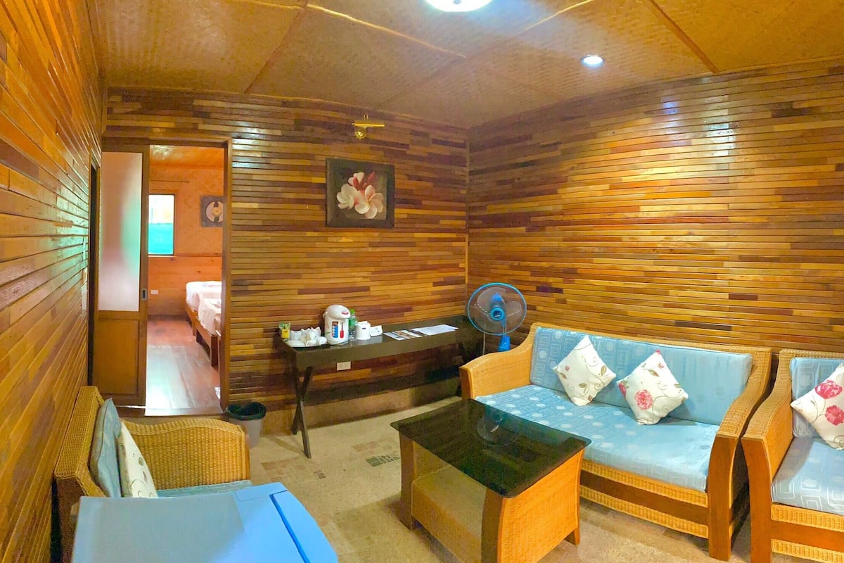 family quadruple room | living area | 24-inch tv with cable channels