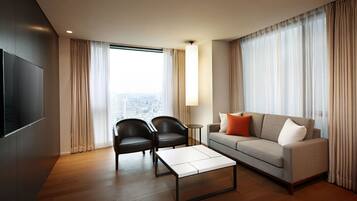 Premium bedding, down comforters, in-room safe, desk