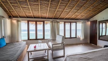 Deluxe Bungalow | Minibar, in-room safe, soundproofing, bed sheets