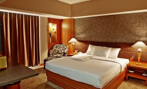 Grand Deluxe Room | Premium bedding, desk, blackout drapes, free wired internet - Treva International Hotel (Jakarta)