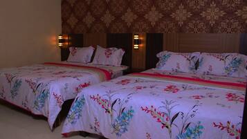 Desk, blackout drapes, rollaway beds (surcharge), WiFi (free)