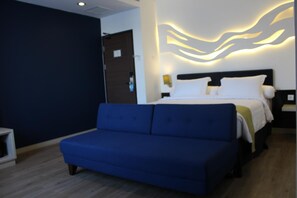 In-room safe, desk, laptop workspace, soundproofing - Bonnet Hotel (Surabaya)