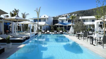 Seasonal outdoor pool, open 7:30 AM to 8:30 PM, free pool cabanas