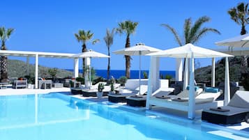 Seasonal outdoor pool, open 7:30 AM to 8:30 PM, free cabanas