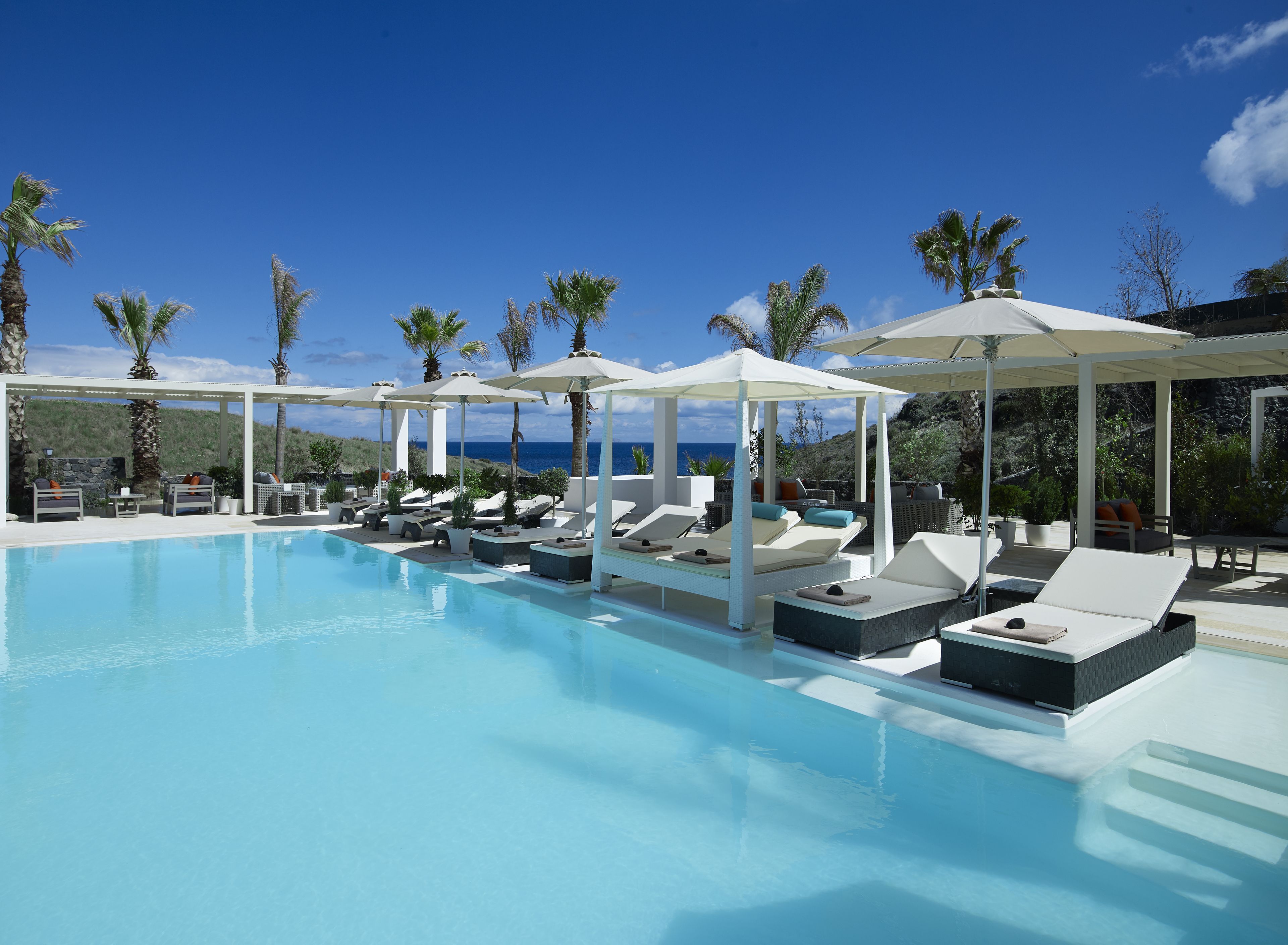 seasonal outdoor pool, open 7:30 am to 8:30 pm, free pool cabanas