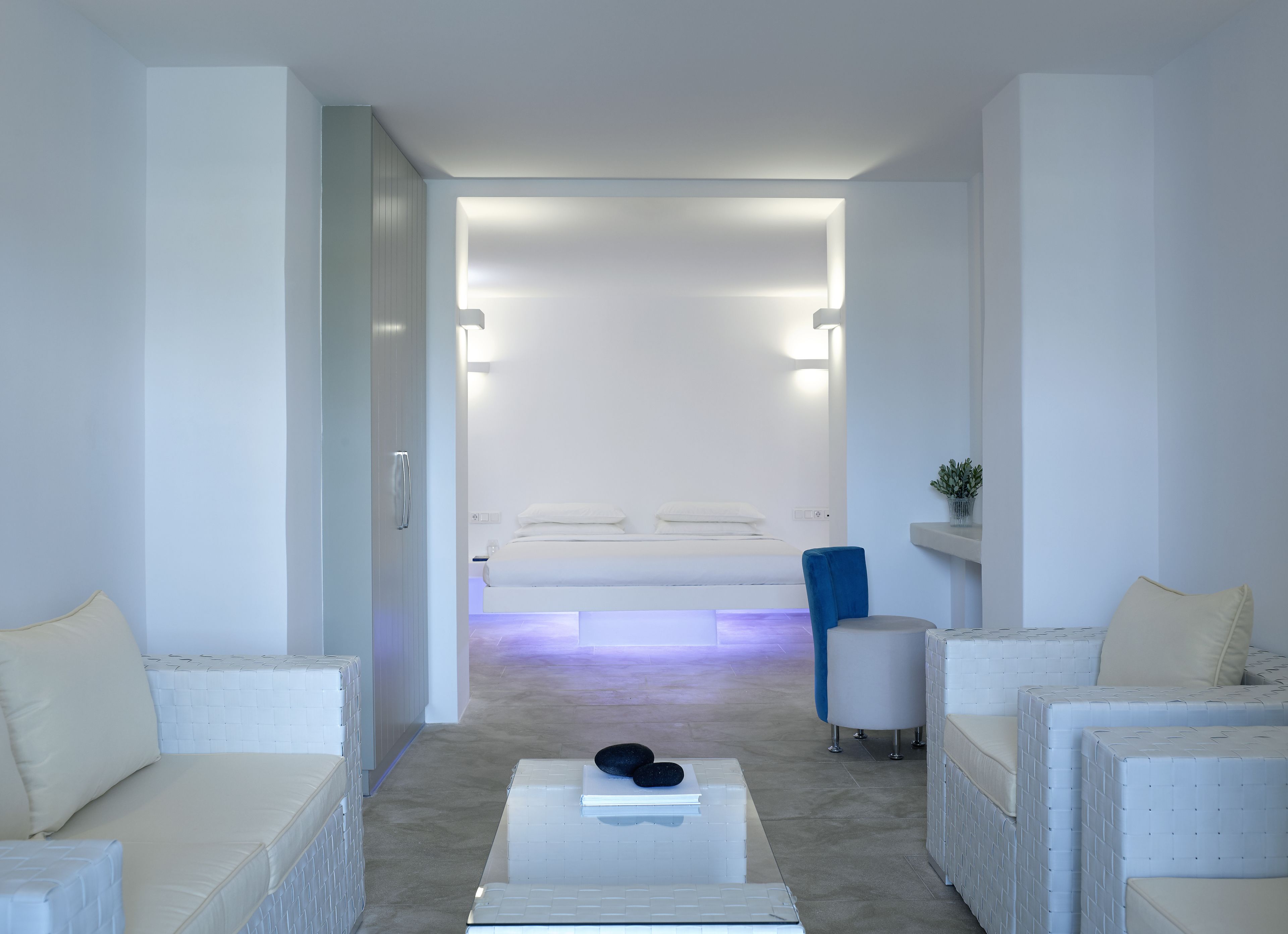 superior room, hot tub, pool view | living area | flat-screen tv, books