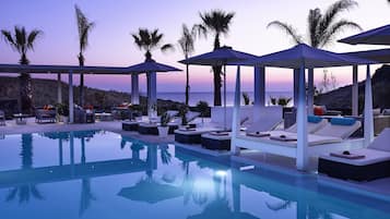 Seasonal outdoor pool, open 7:30 AM to 8:30 PM, free pool cabanas