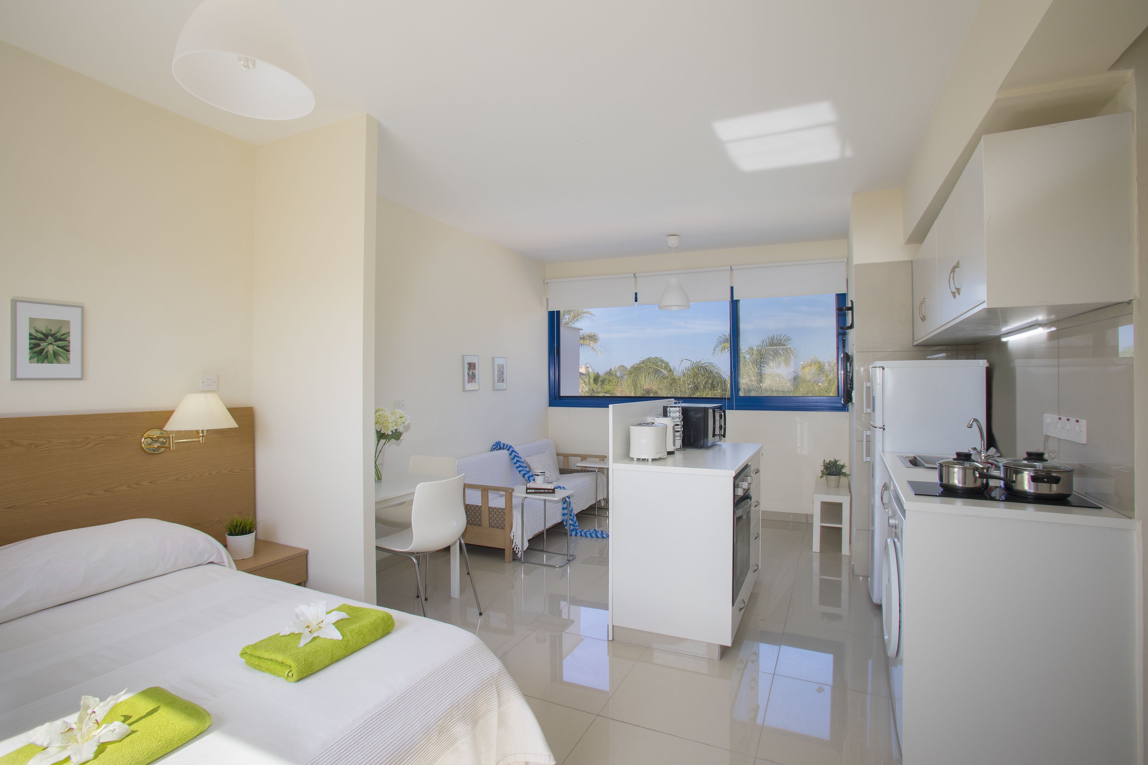 Studio, Pool View (8807) | Living area | Flat-screen TV