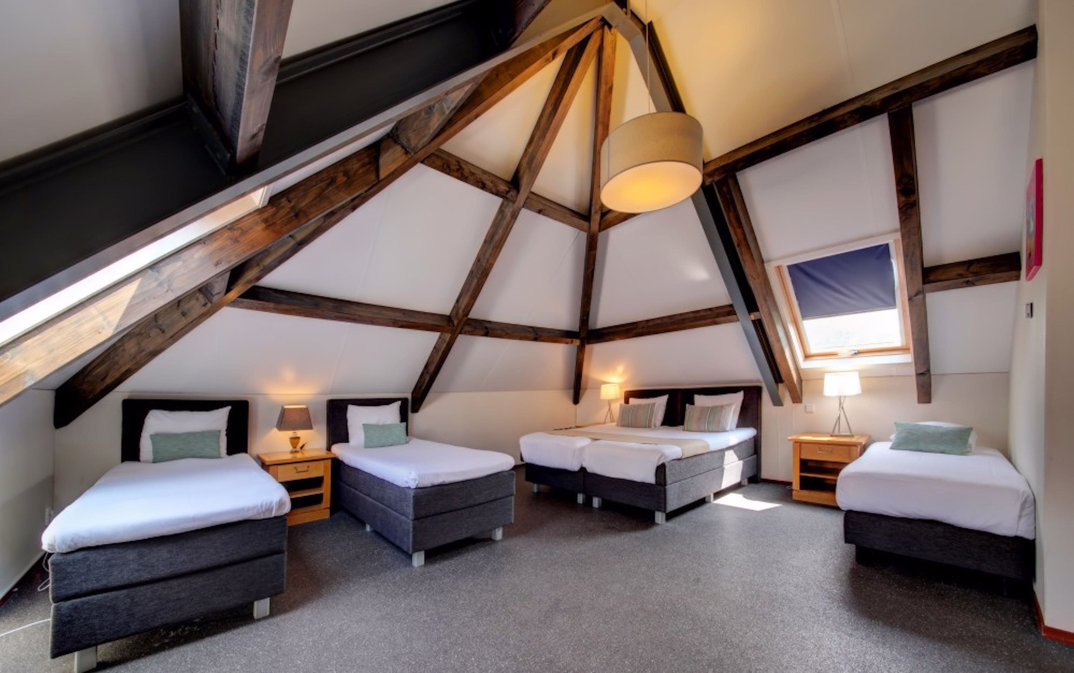 family room, non smoking, garden view | down duvets, pillow-top beds, minibar, desk