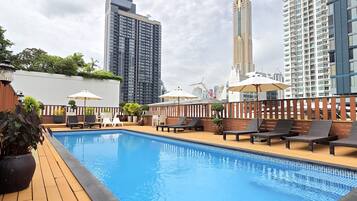 Outdoor pool, pool umbrellas, pool loungers
