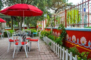 Breakfast, lunch, dinner served; Regional cuisine, garden views 