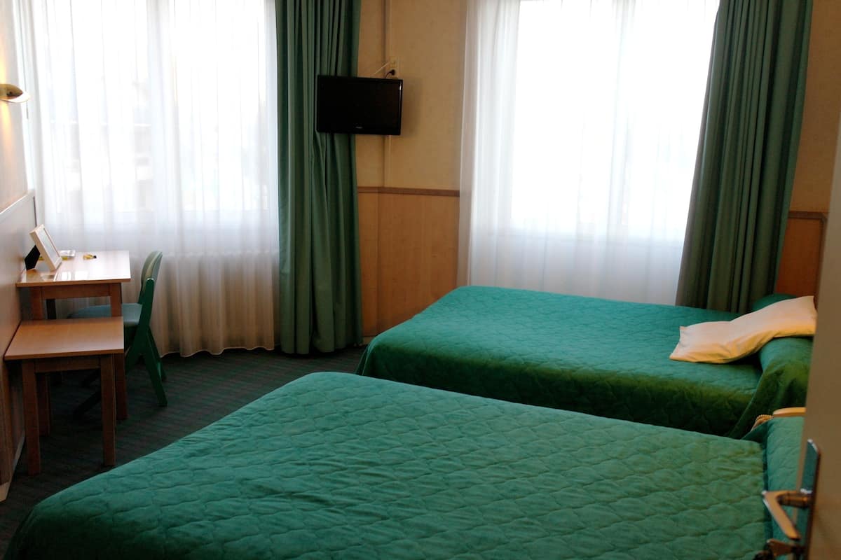 Standard Quadruple Room | Desk, soundproofing, cribs (free), rollaway beds (surcharge)