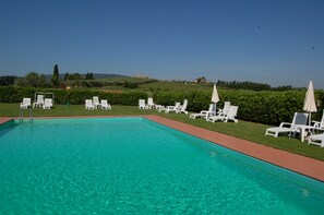 Seasonal outdoor pool, pool umbrellas, pool loungers
