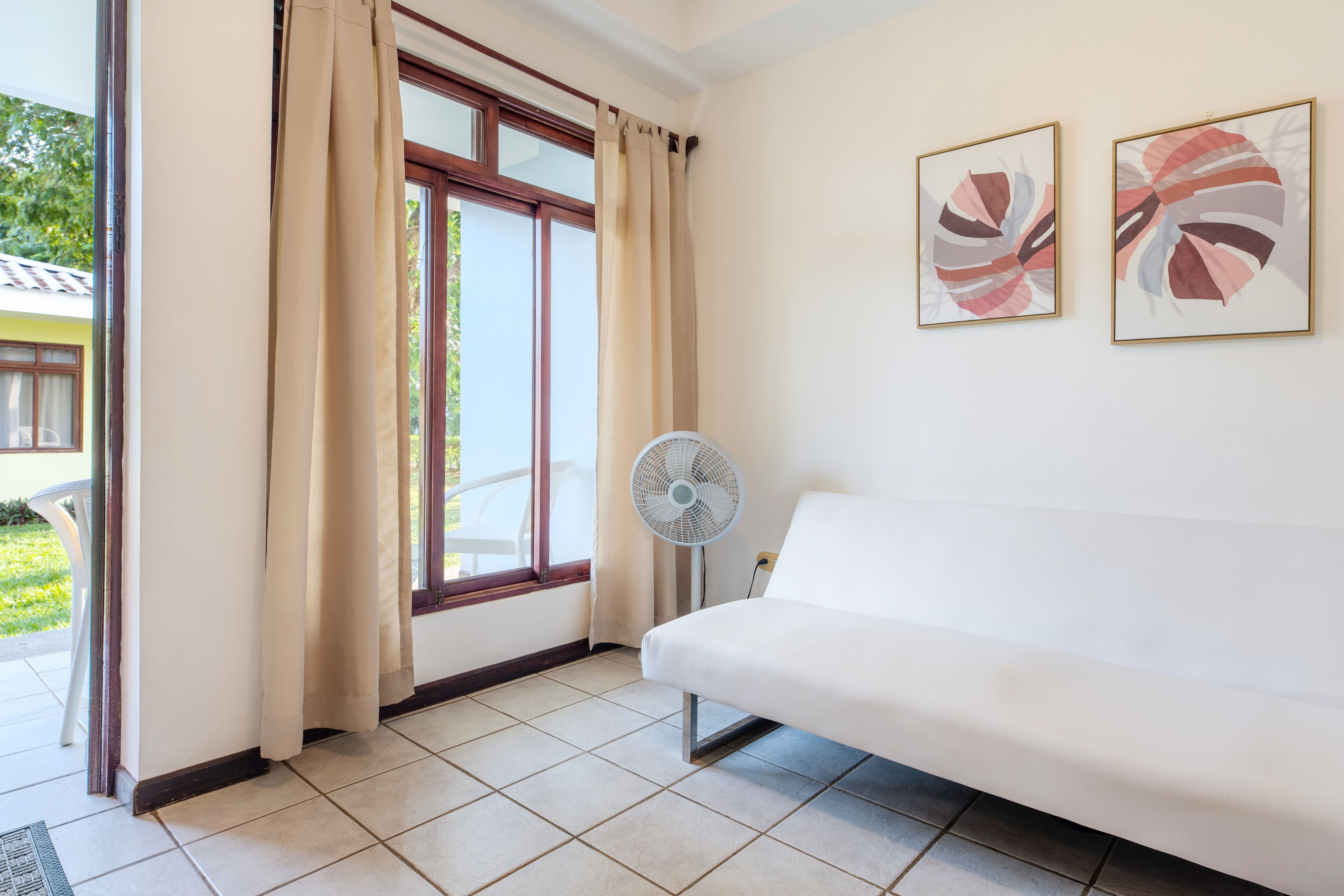 superior villa | living area | 32-inch flat-screen tv with cable channels, tv