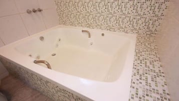 Quarto (Minuty) | Banheira de hidromassagem
