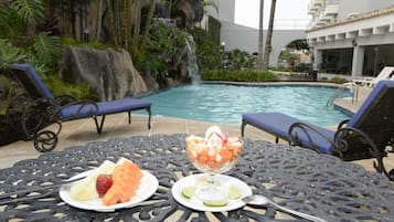 Outdoor pool, sun loungers