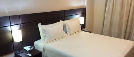 Superior Single Room | Minibar, in-room safe, desk, blackout drapes