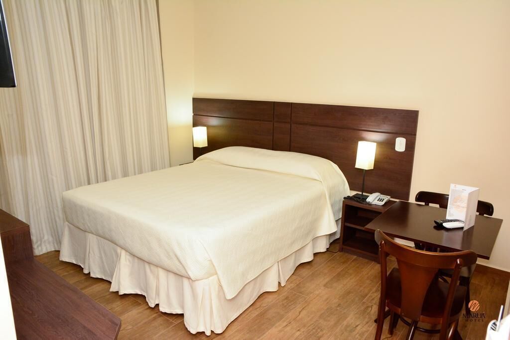 single room | minibar, in-room safe, desk, blackout curtains