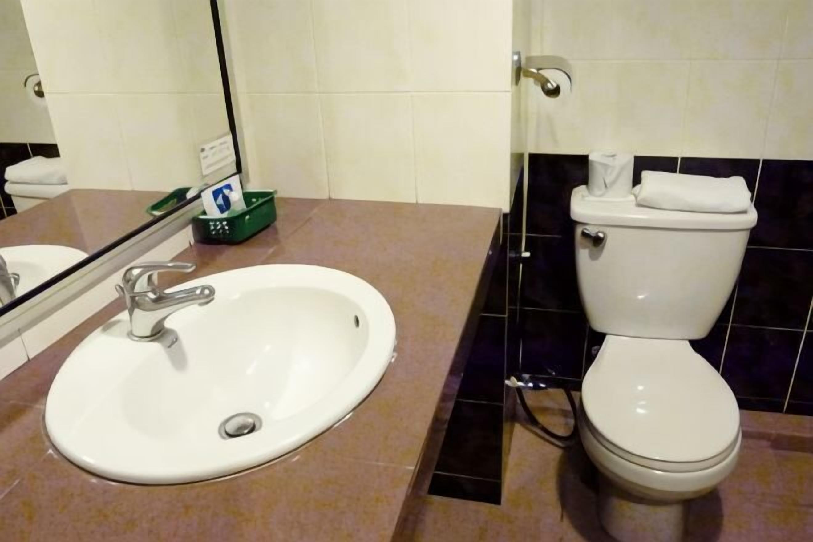 Shower, slippers, bidet, towels