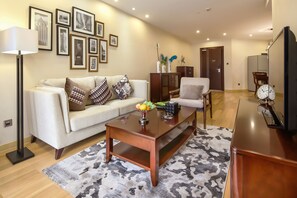 Chambre familiale | Aire de séjour | Téléviseur ACL