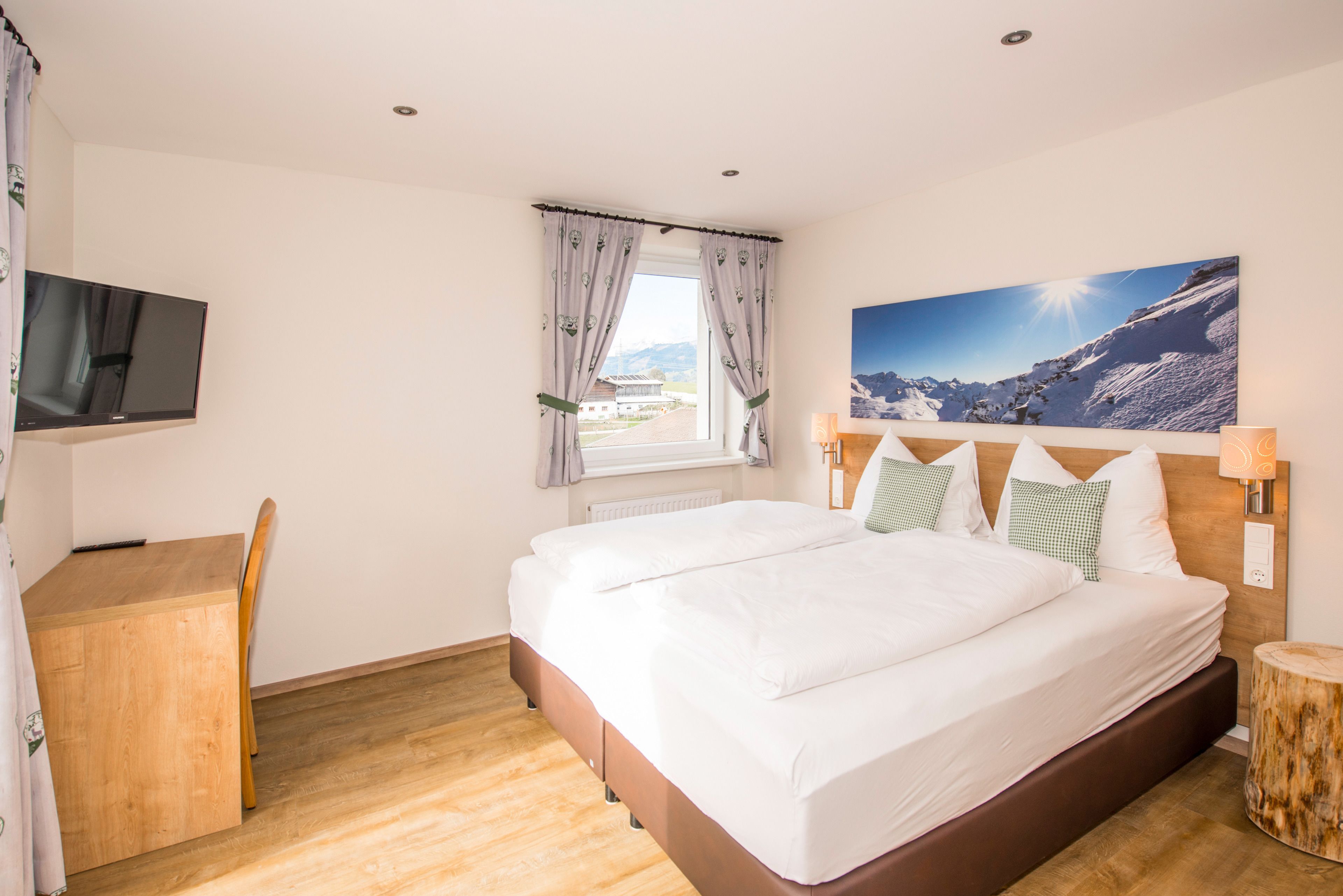 deluxe apartment, 2 bedrooms | living area | flat-screen tv