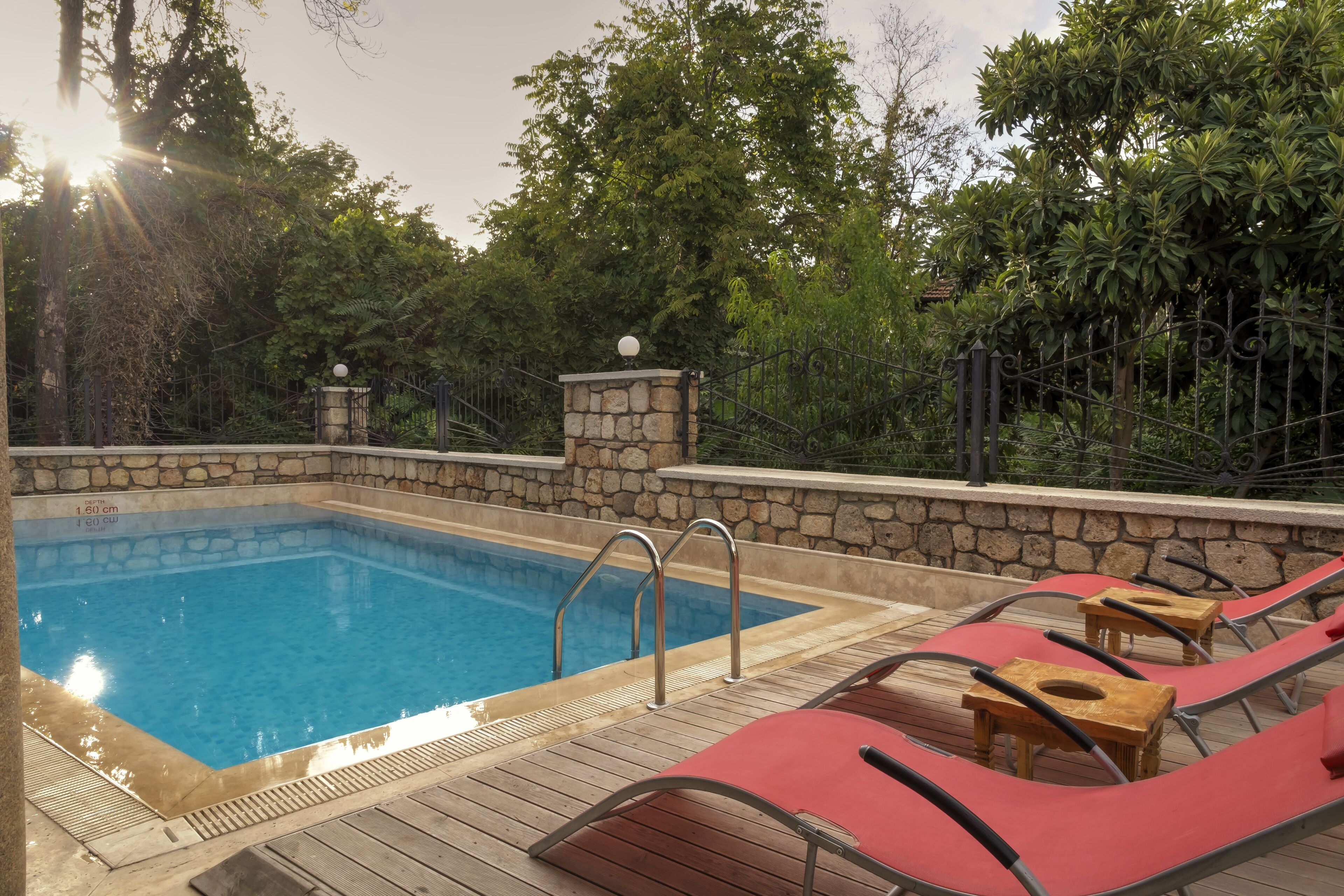 seasonal outdoor pool, pool loungers