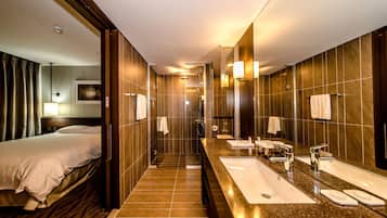 Premier Family | Bathroom | Combined shower/tub, deep soaking tub, rainfall showerhead, hair dryer