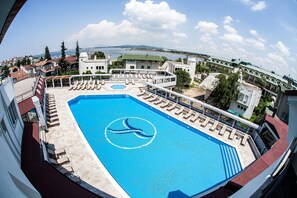 Seasonal outdoor pool, free pool cabanas, pool umbrellas