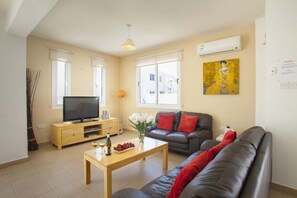 Villa, 3 Bedrooms (Daffodil) | Living room | Flat-screen TV, DVD player