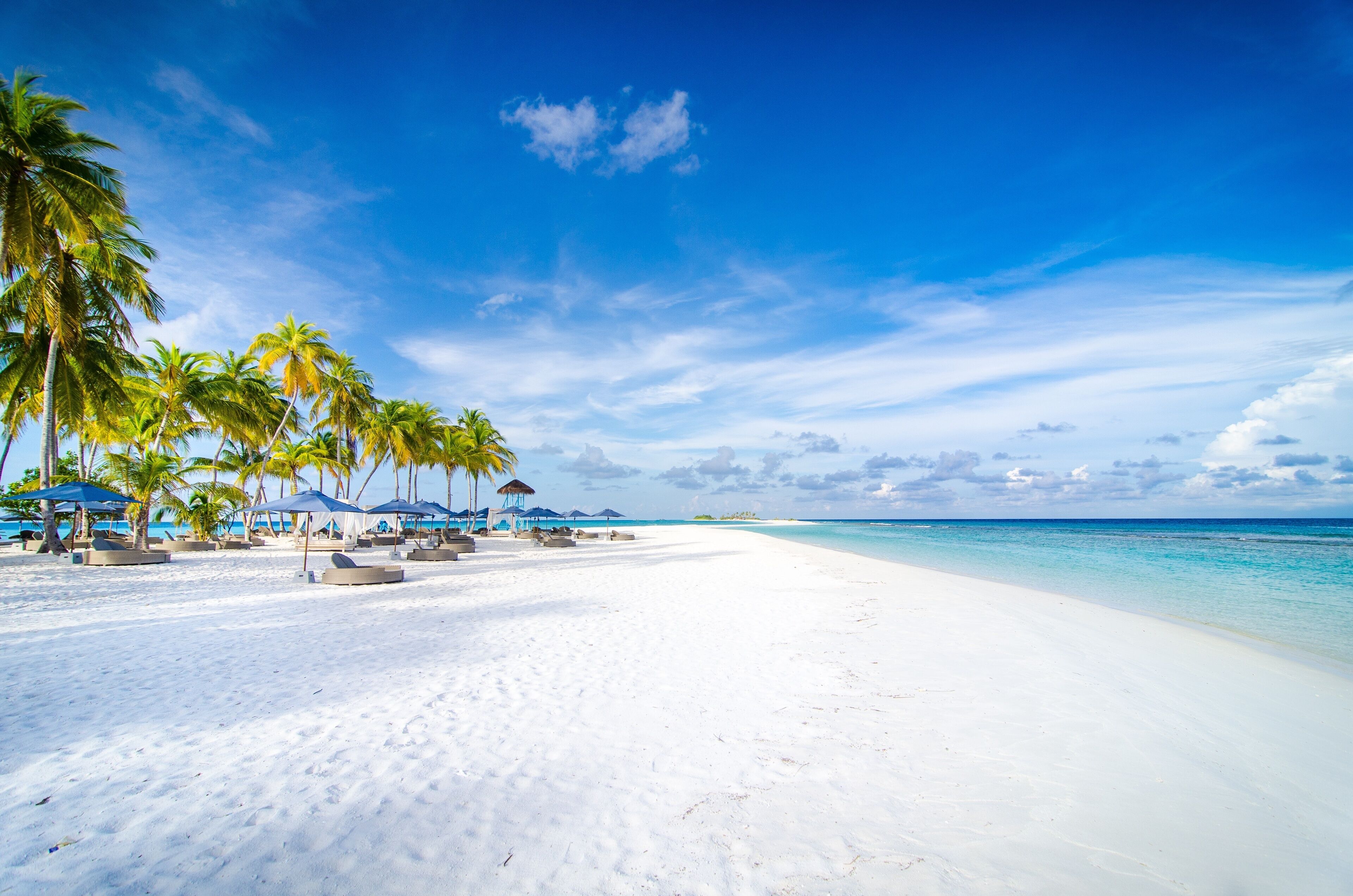 On the beach, white sand, free beach cabanas, sun-loungers